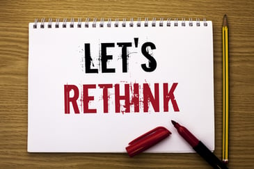 rethink printed on notebook